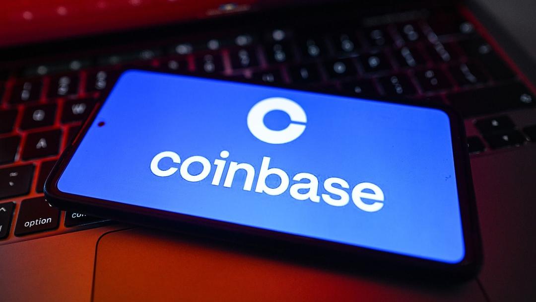 Coinbase Cuts 700 Jobs, Cites Crypto Slump & AI