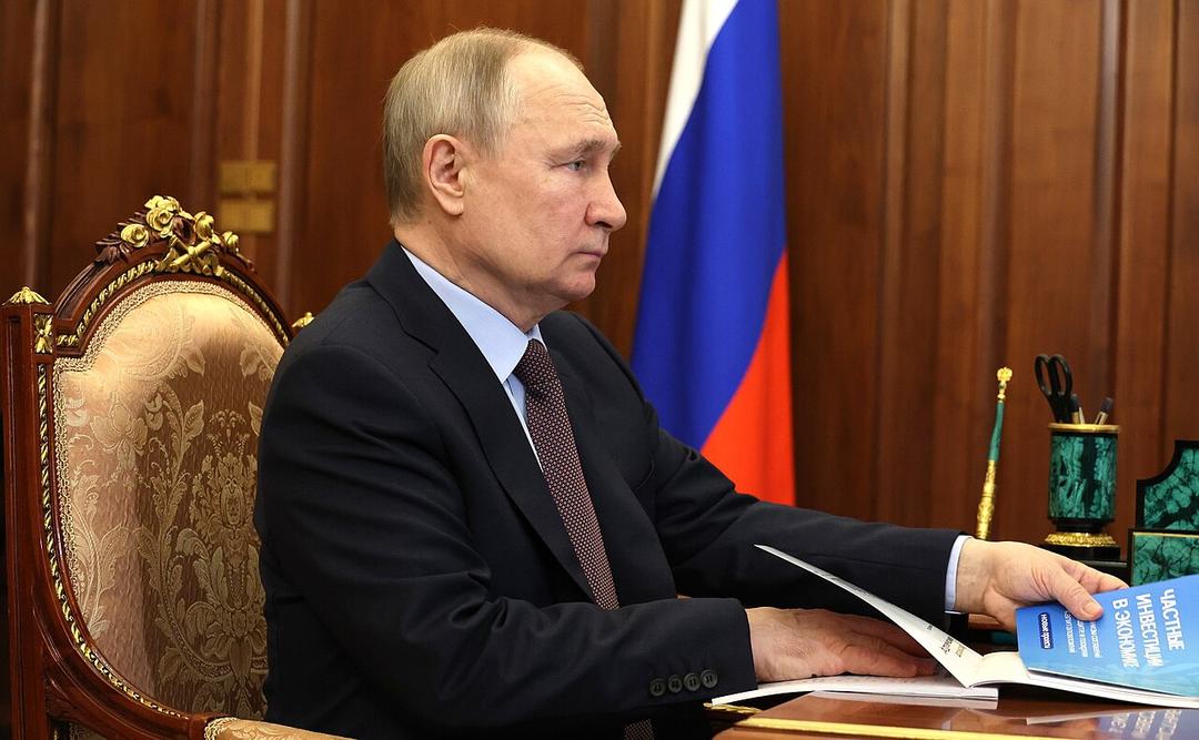 Putin Shows 'Signed Peace Agreement' with Ukraine
