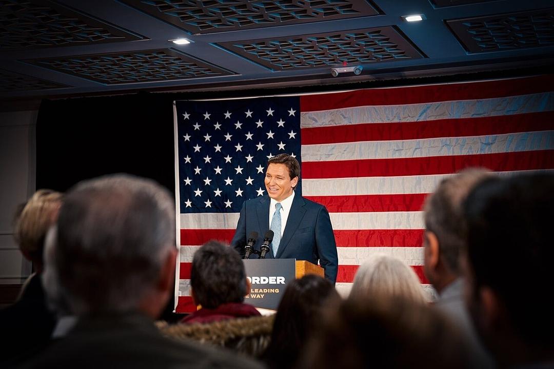 DeSantis Campaigns in Iowa, Criticizes Biden and Trump