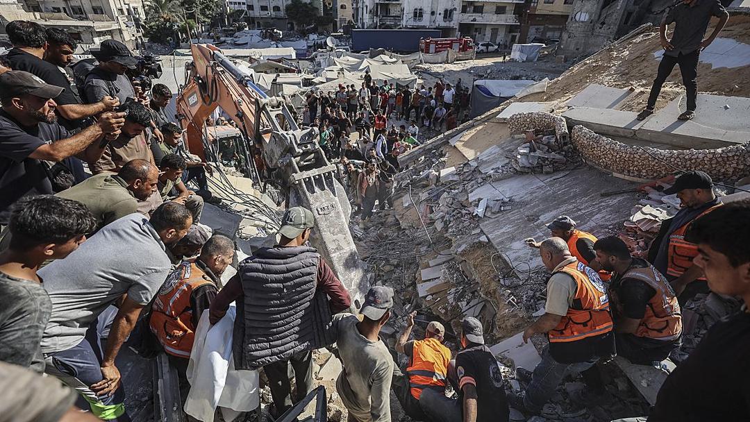 Gaza City Building Collapse Kills at Least 20, Dozens Feared Buried
