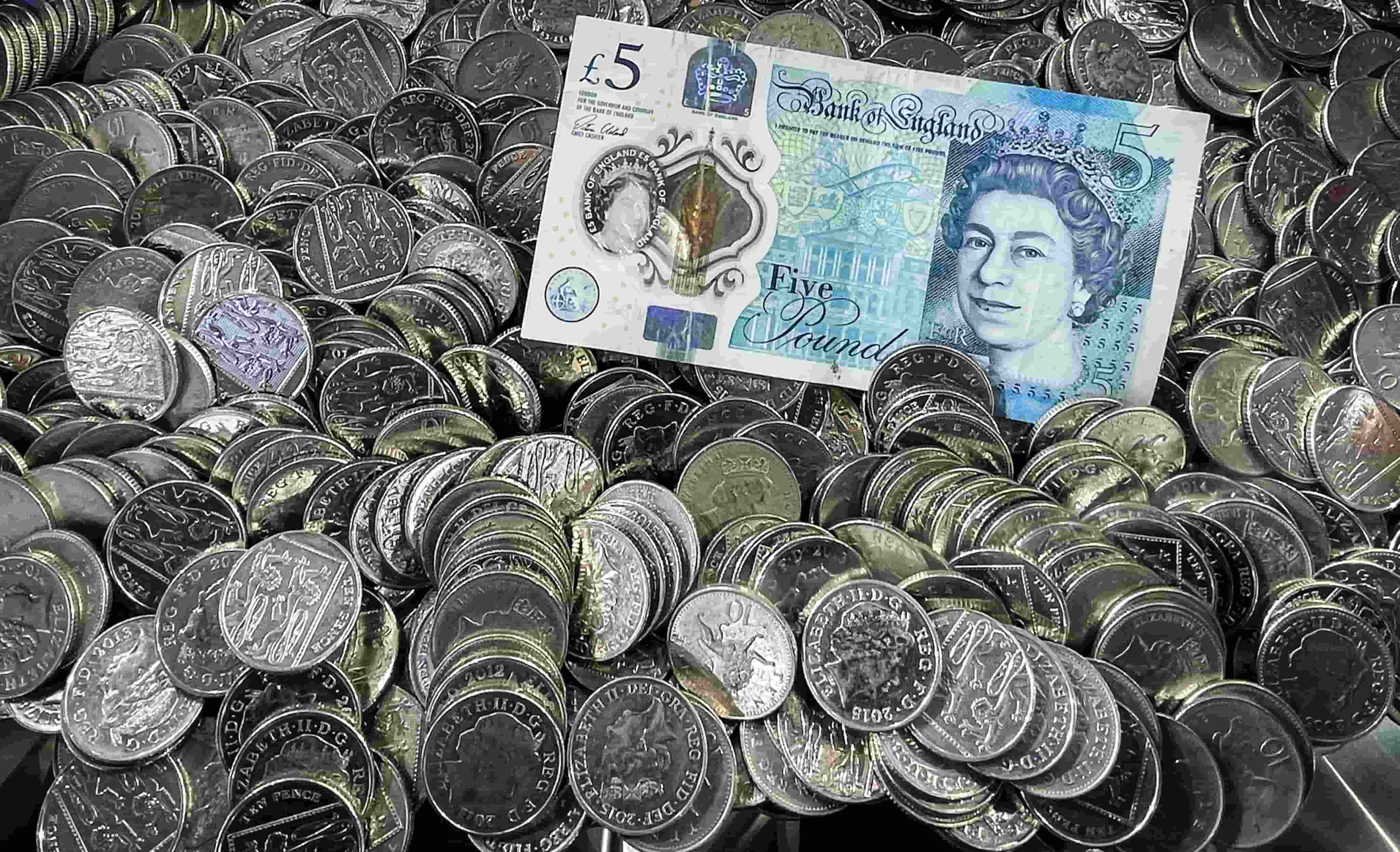 UK Raises Minimum Wage by 9.8%